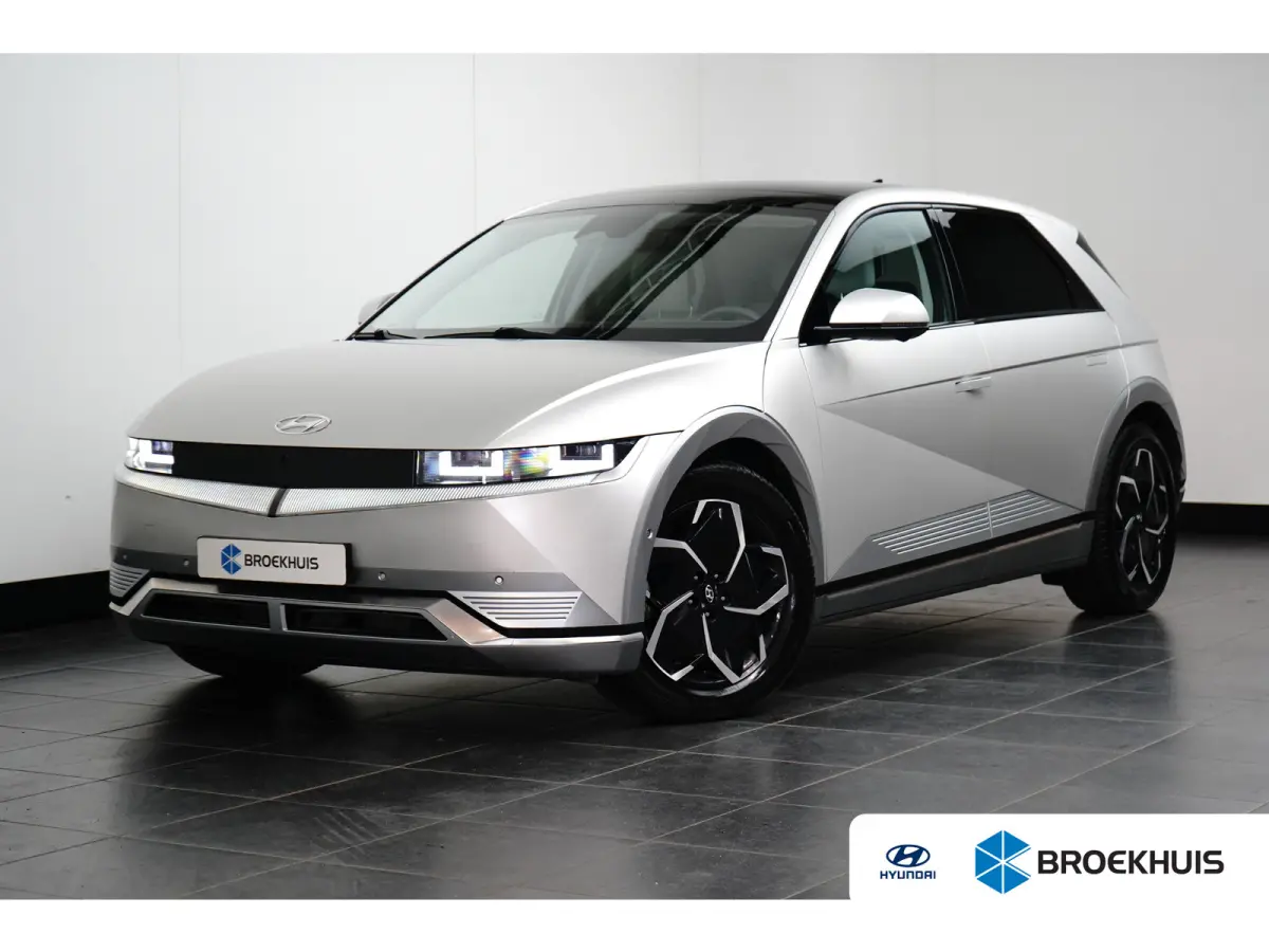 Lounge 77.4 kWh | Achterstoelen verwarmd | Achteruitrij assistent | Airco (automatisch)