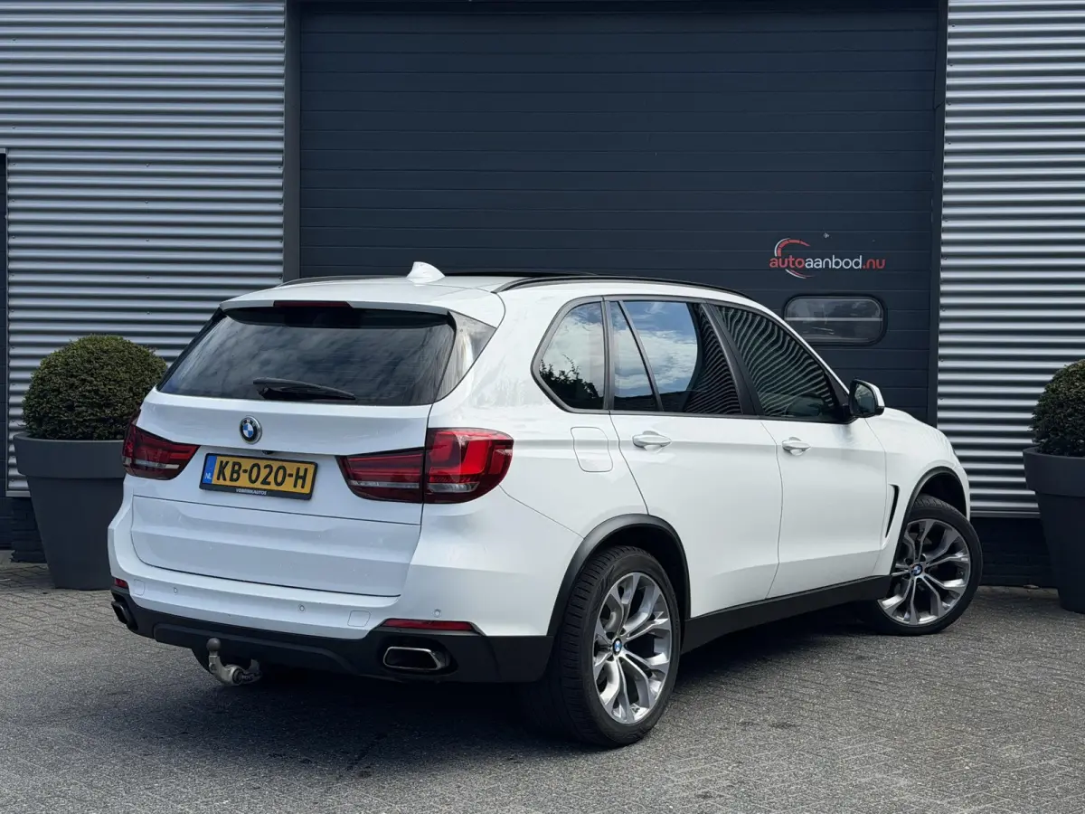 xDrive40e | Panoramadak | Head-Up Display | Camera | Elektrische Trekhaak | Elektrische Achterklep |