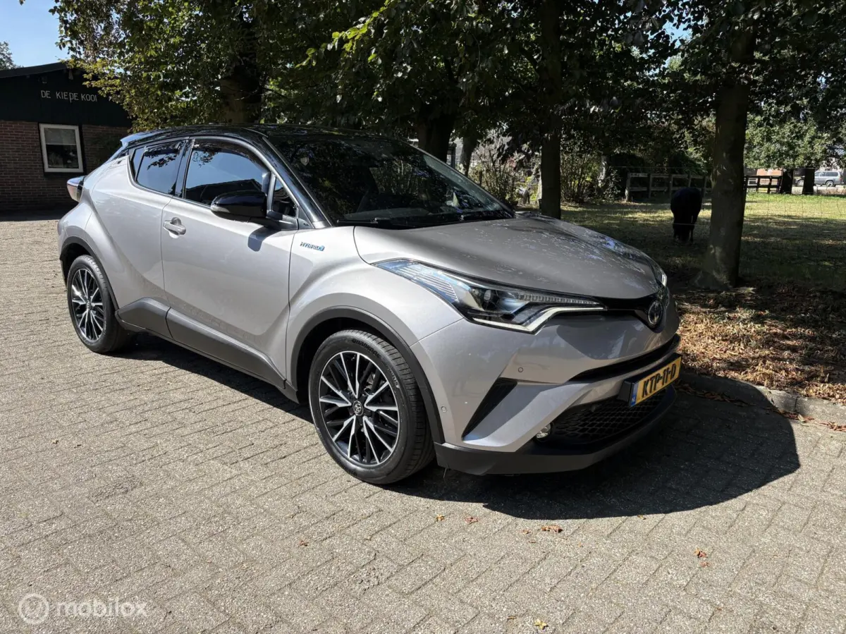 1.8 Hybrid Bi-Tone JBL Keyless all in rijklaar