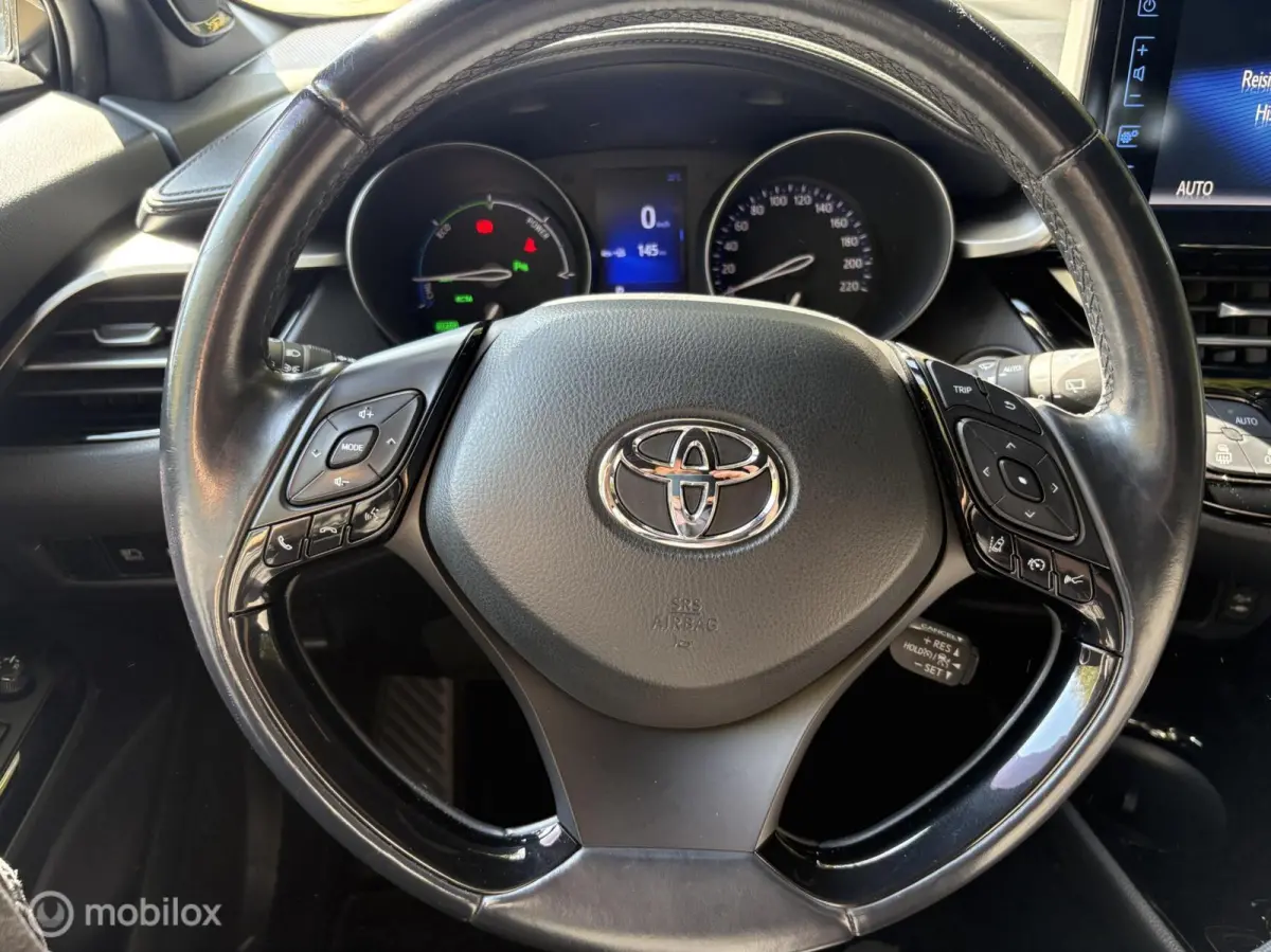 1.8 Hybrid Bi-Tone JBL Keyless all in rijklaar