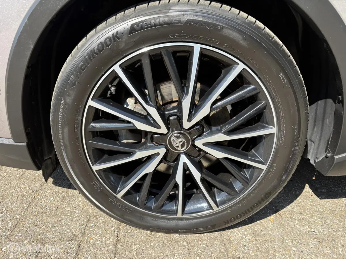 1.8 Hybrid Bi-Tone JBL Keyless all in rijklaar