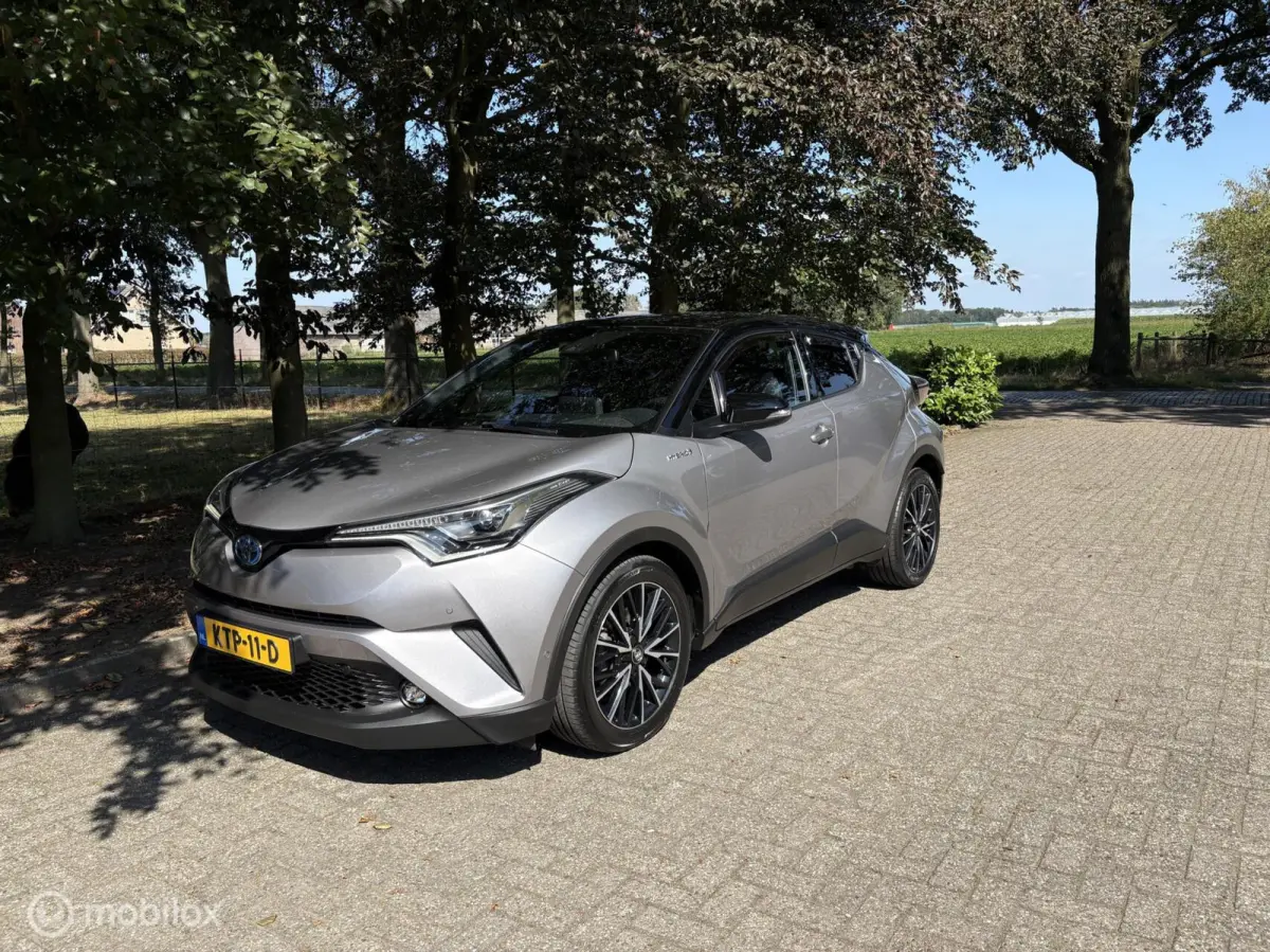 1.8 Hybrid Bi-Tone JBL Keyless all in rijklaar