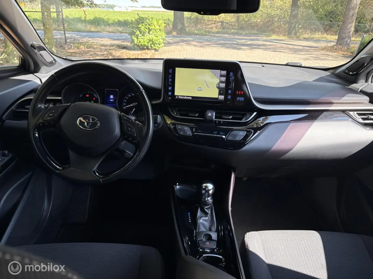 1.8 Hybrid Bi-Tone JBL Keyless all in rijklaar