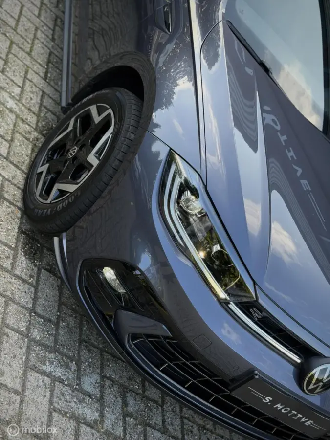 1.0 TSI R-Line. BTW, Camera, DSG, IQ, Clima, Stoelvwr, ACC,