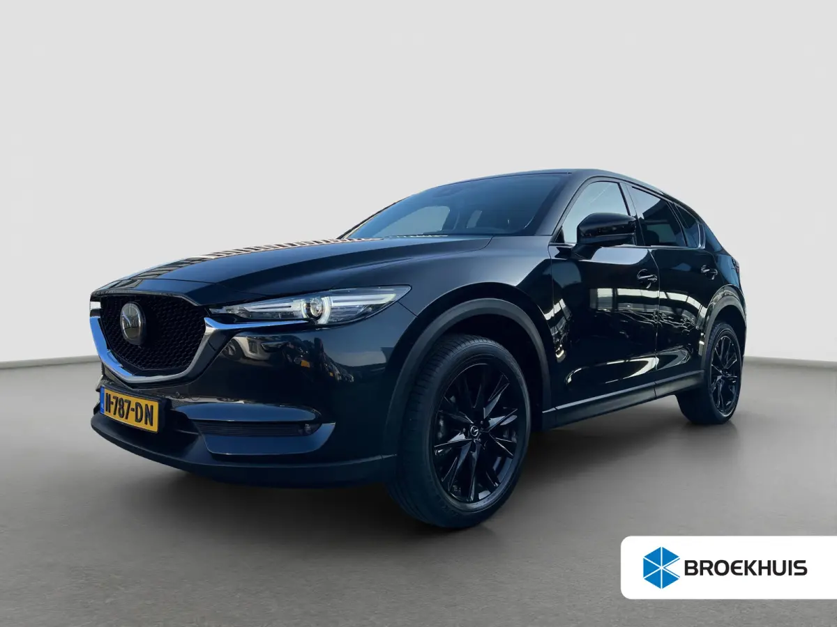 2.0 SkyActiv-G 165 Newground Automaat | 360 graden camera | Adaptive cruise control | Elektrische achterklep | Bestuurdersstoel met geheugen | Half leder | Stoelverwarming | Dodehoek detecti