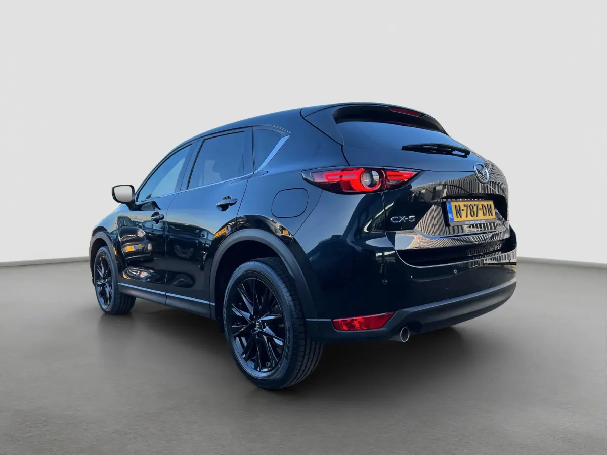 2.0 SkyActiv-G 165 Newground Automaat | 360 graden camera | Adaptive cruise control | Elektrische achterklep | Bestuurdersstoel met geheugen | Half leder | Stoelverwarming | Dodehoek detecti