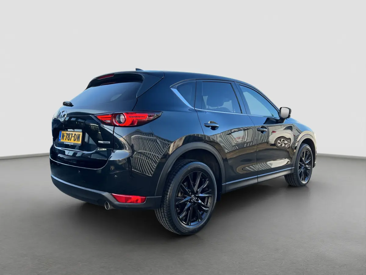 2.0 SkyActiv-G 165 Newground Automaat | 360 graden camera | Adaptive cruise control | Elektrische achterklep | Bestuurdersstoel met geheugen | Half leder | Stoelverwarming | Dodehoek detecti