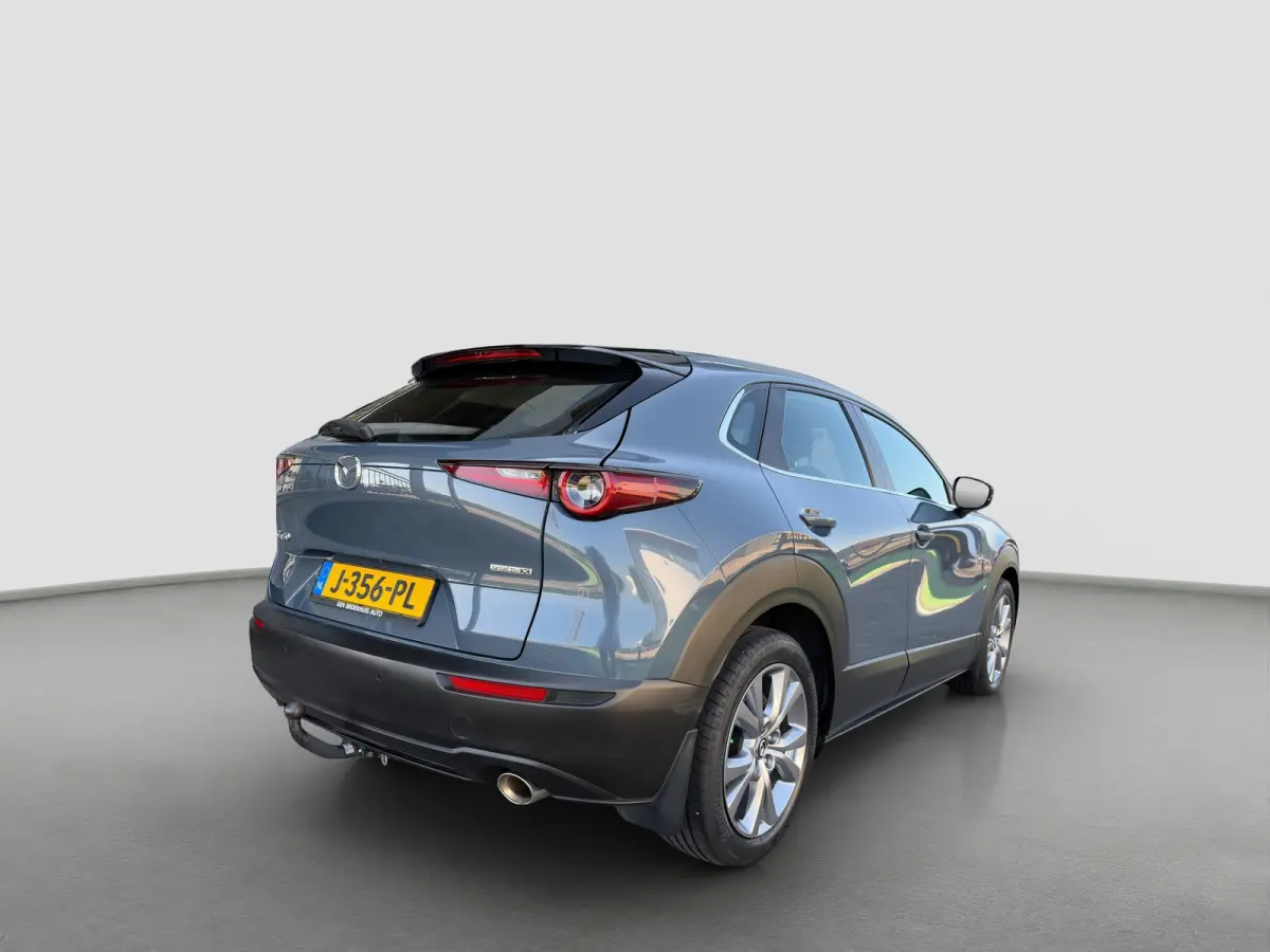 2.0 180pk SkyActiv-X M Hybrid Comfort | Trekhaak | Camera | Climate controle | Adaptive cruise controle | Dodehoek detectie | Elektrische achterklep | Keyless entry | Sensoren voor en achter