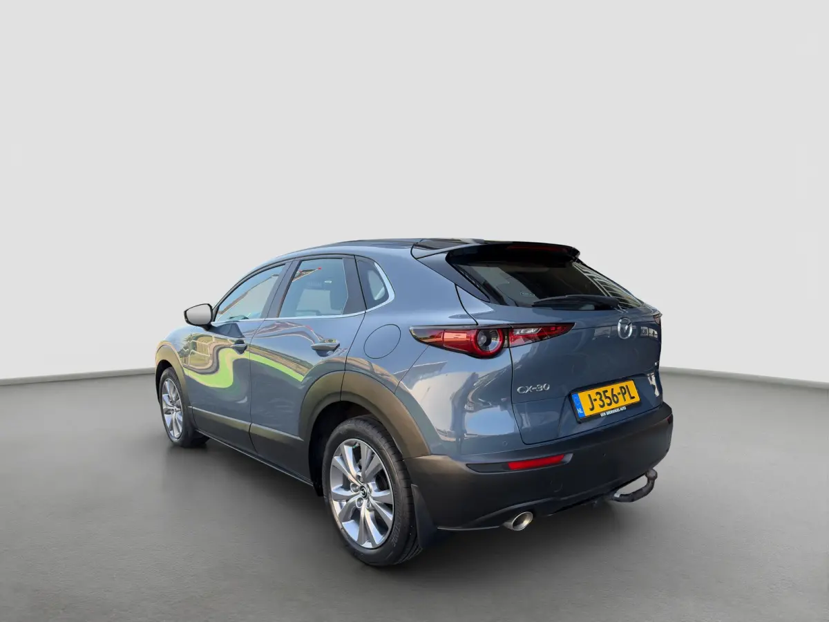 2.0 180pk SkyActiv-X M Hybrid Comfort | Trekhaak | Camera | Climate controle | Adaptive cruise controle | Dodehoek detectie | Elektrische achterklep | Keyless entry | Sensoren voor en achter