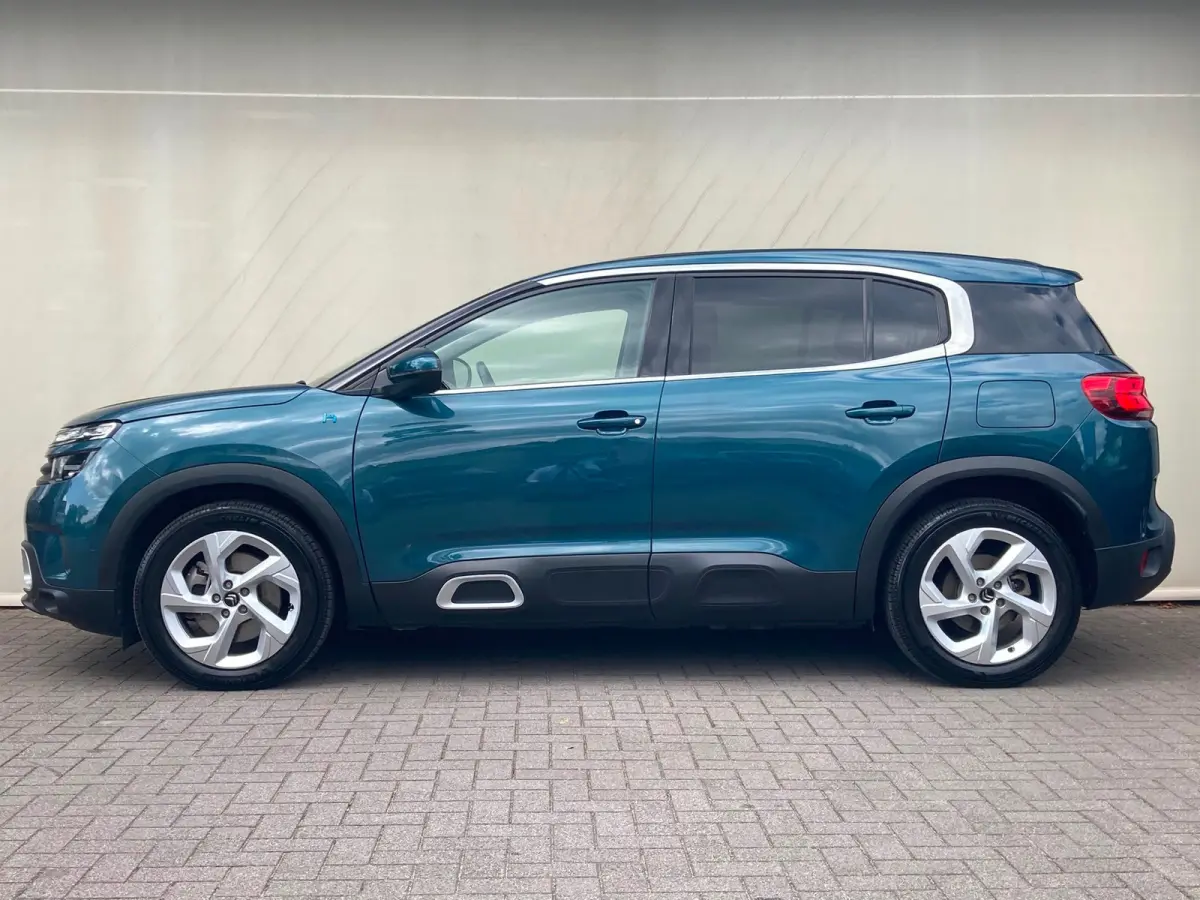 1.6 Plug-in Hybrid 225 ë-Series Airco | Camera | Cruise Control | DAB | Dode Hoek | Keyless | LMV 18" | Navi | PDC V&A | Stoelverwarming | Trekhaak |