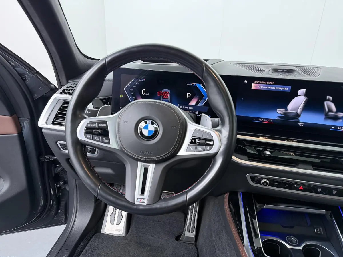 M60i xDrive M-Sport Pro | Skylounge | Head-Up | Adaptive Cruise | Bowers & Wilkens | Stoelventilatie & Verwarming | Trekhaak | Massage | Comfort Access | Zonnescherm achter |