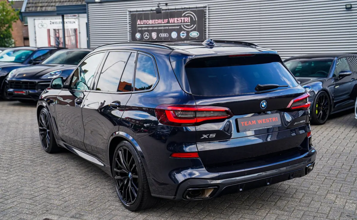 XDrive45e High Executive | Panorama | Harman/Kardon | Driving Assisted | Trekhaak | 22 inch | HuD | Head up Display