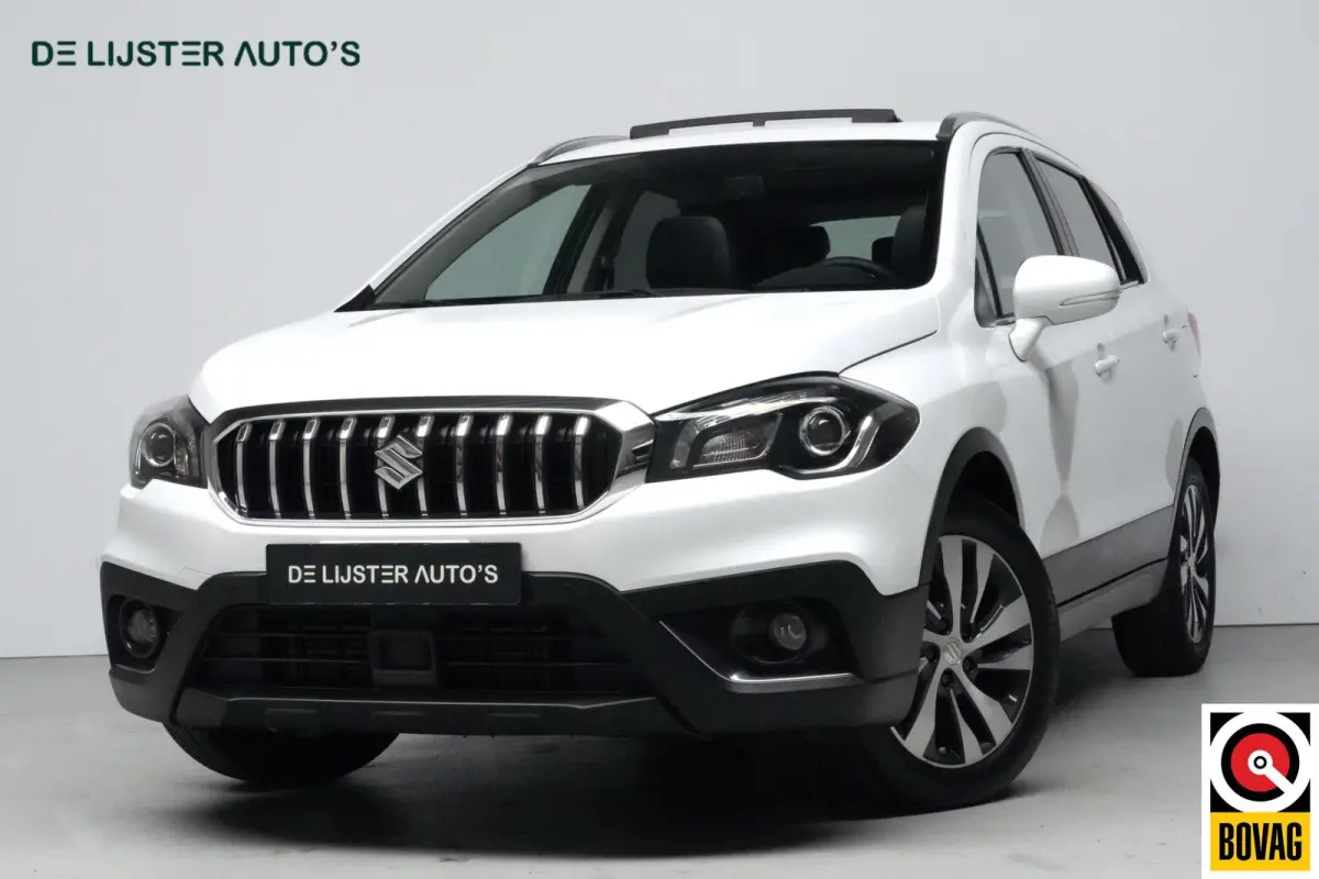 SX4 1.4 Boosterjet Style 140 PK | Pano-dak | CarPlay | Acc | Leder | Stoelverwarming | Camera | Trekhaak | Pdc | Keyless | Led |