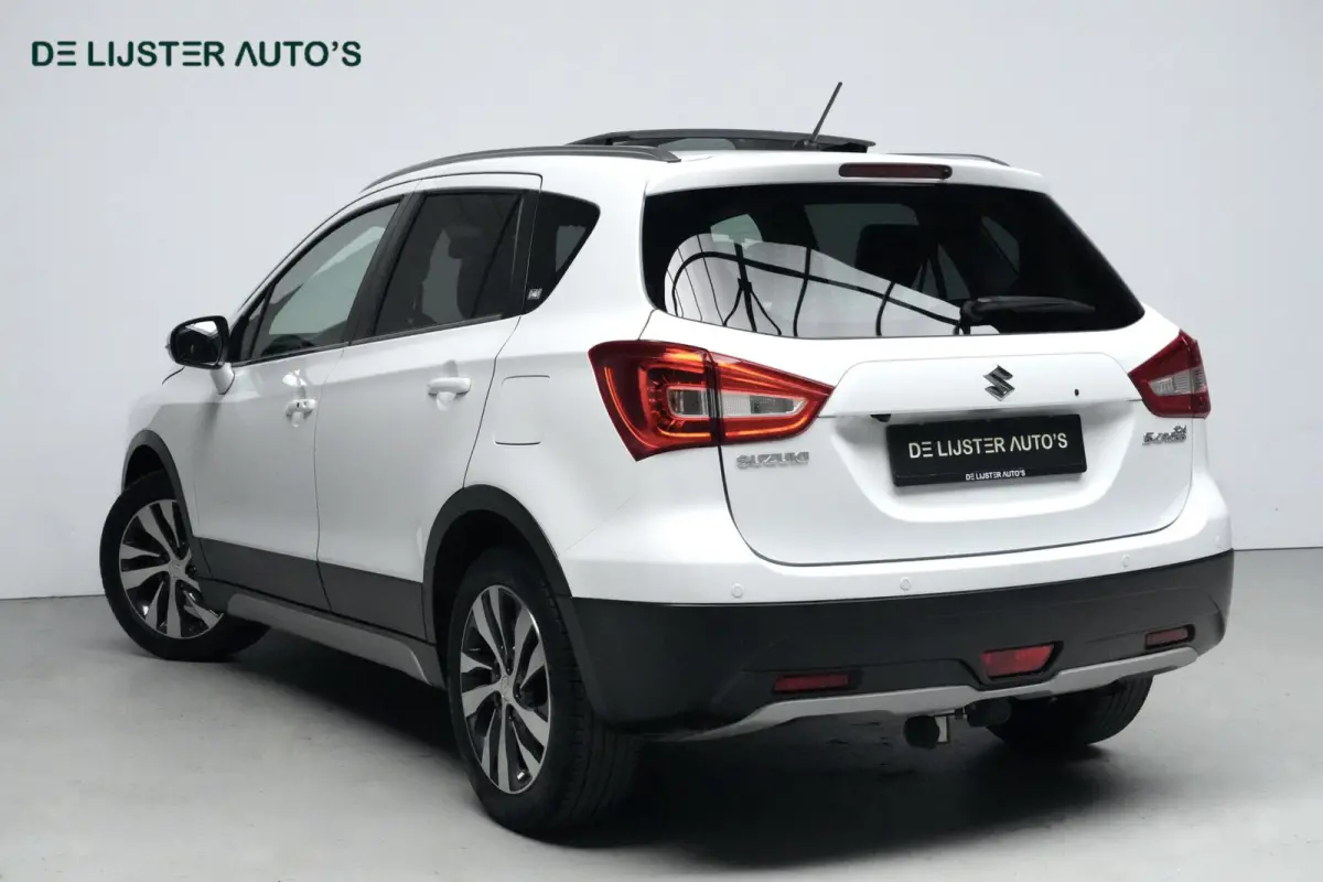 SX4 1.4 Boosterjet Style 140 PK | Pano-dak | CarPlay | Acc | Leder | Stoelverwarming | Camera | Trekhaak | Pdc | Keyless | Led |