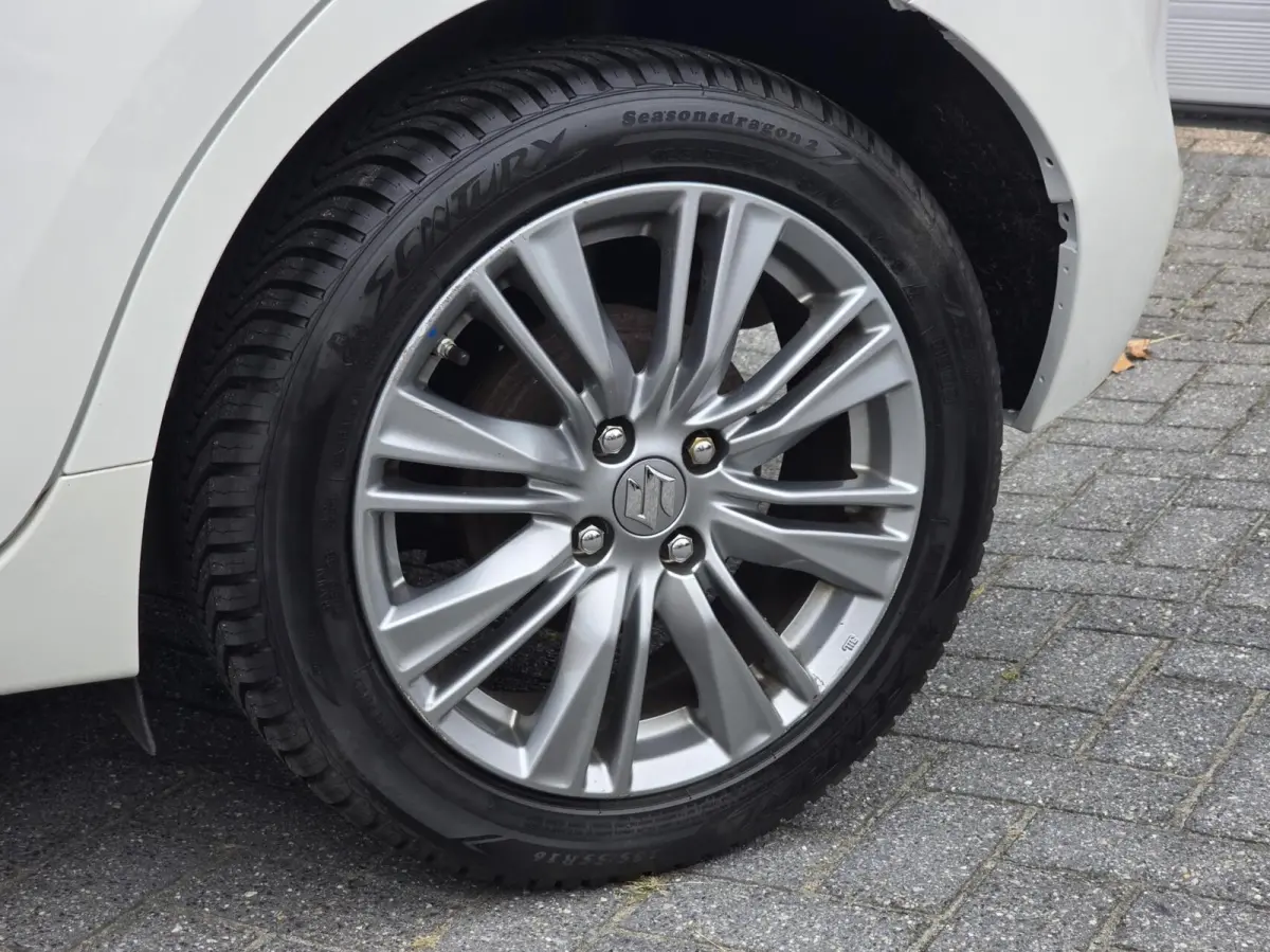 1.2 Exclusive Automaat Xenon/Stoelverw./Airco
