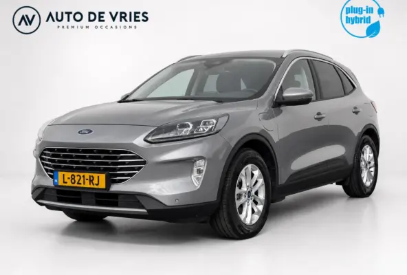 2.5 PHEV 225pk Titanium X | Navigatie | Camera | Winterpakket | B&O sound | Trekhaak