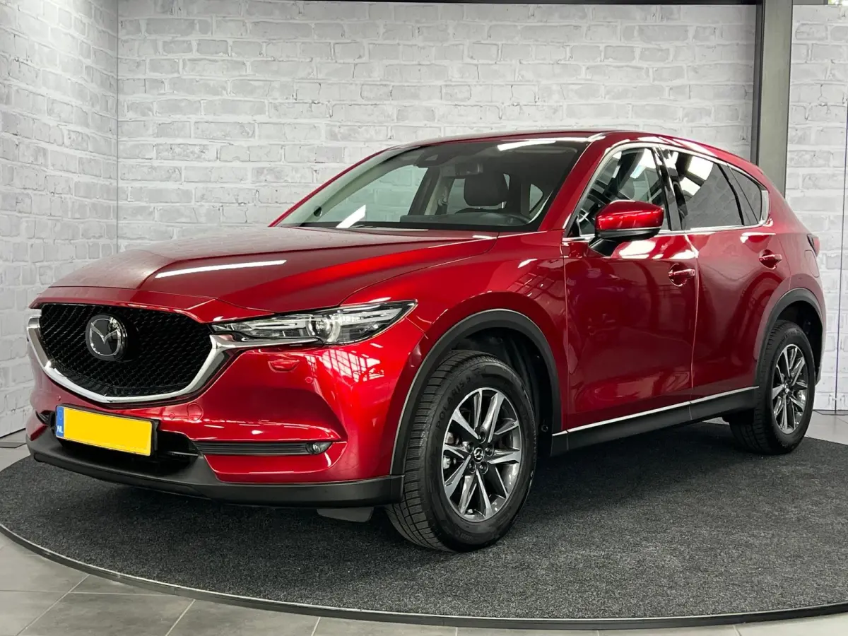 2.5 4WD SkyActiv-G 194 Luxury Pano HUD Trekhaak BOSE Soul Red