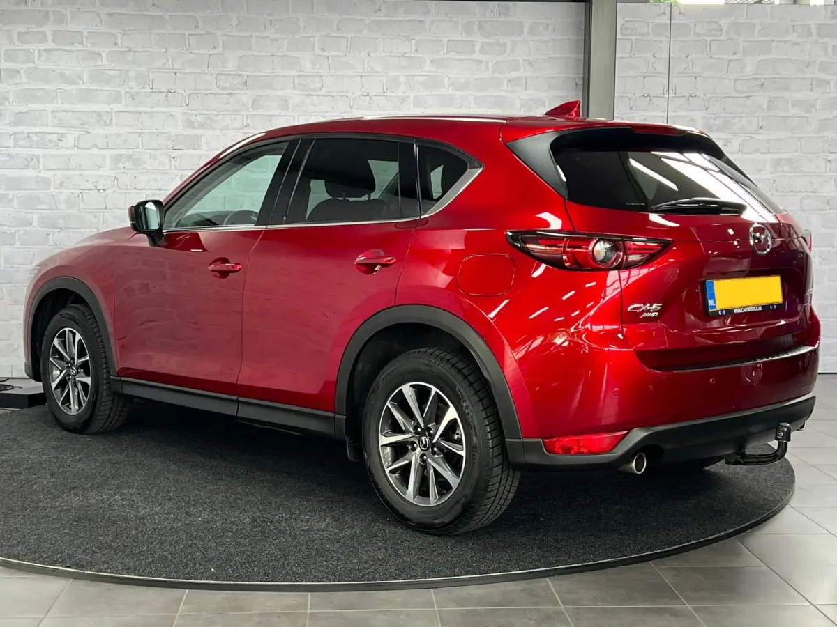 2.5 4WD SkyActiv-G 194 Luxury Pano HUD Trekhaak BOSE Soul Red