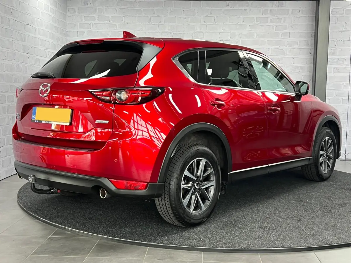 2.5 4WD SkyActiv-G 194 Luxury Pano HUD Trekhaak BOSE Soul Red