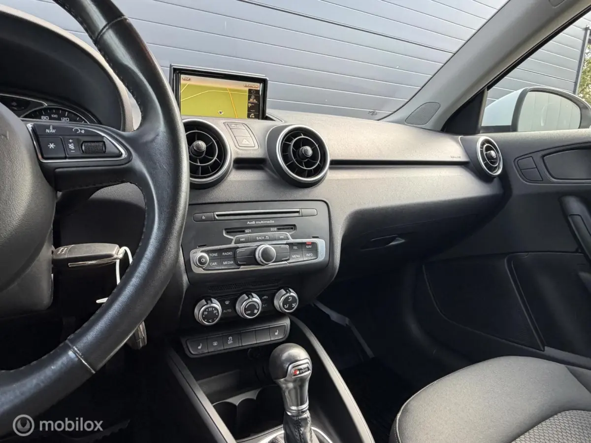 1.0 TFSI S-Tronic Sport CLIMA*CRUISE*NAV*PDC*STOELVERW