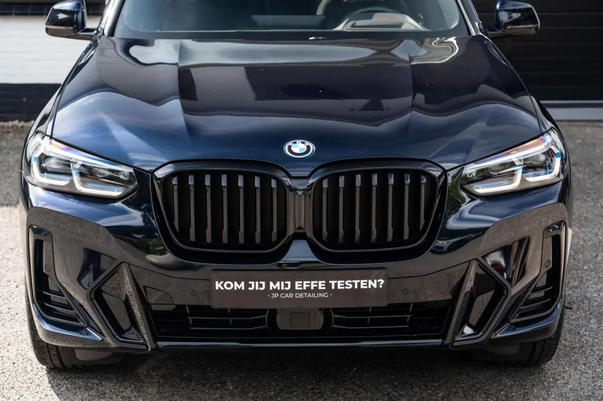 XDrive30e M-sport Carbon Zwart Pano H&K HUD Trekhaak