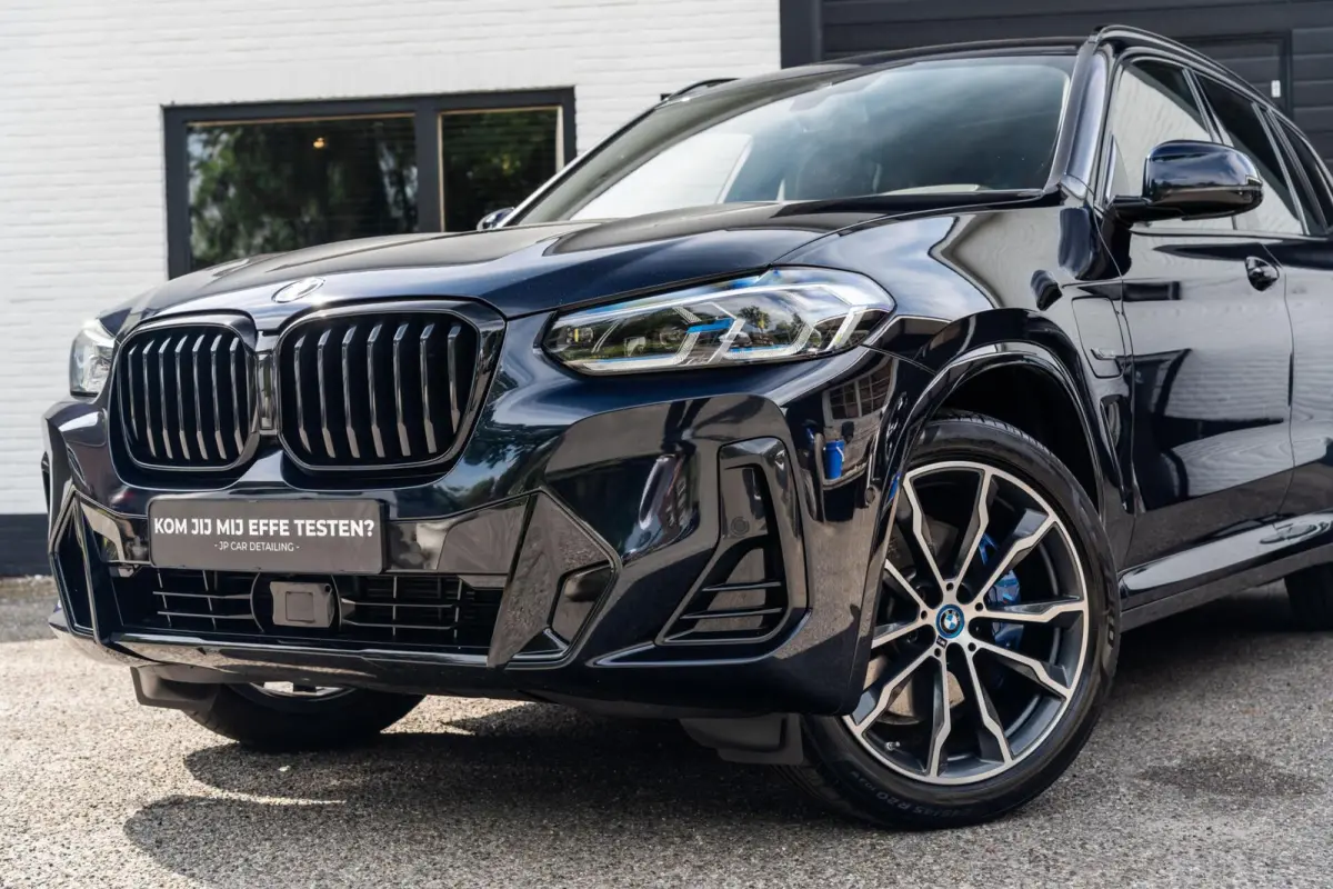 XDrive30e M-sport Carbon Zwart Pano H&K HUD Trekhaak
