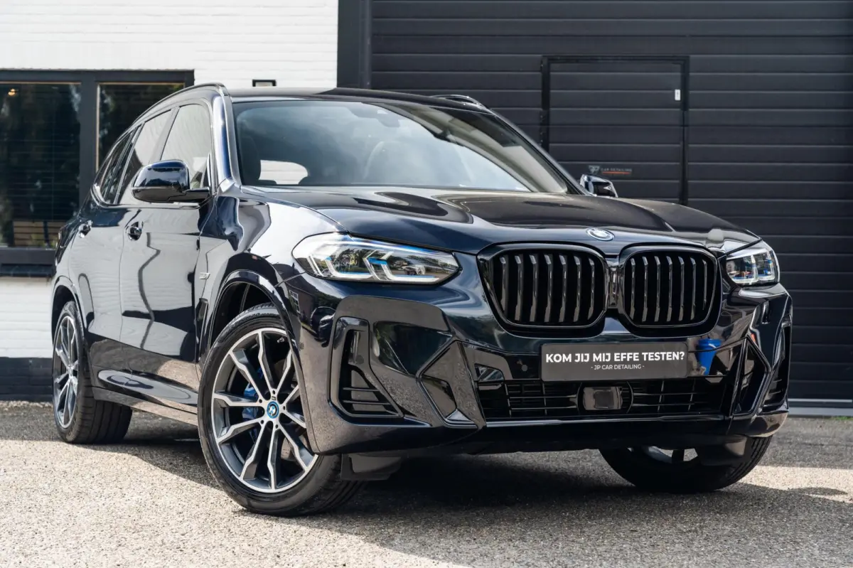XDrive30e M-sport Carbon Zwart Pano H&K HUD Trekhaak
