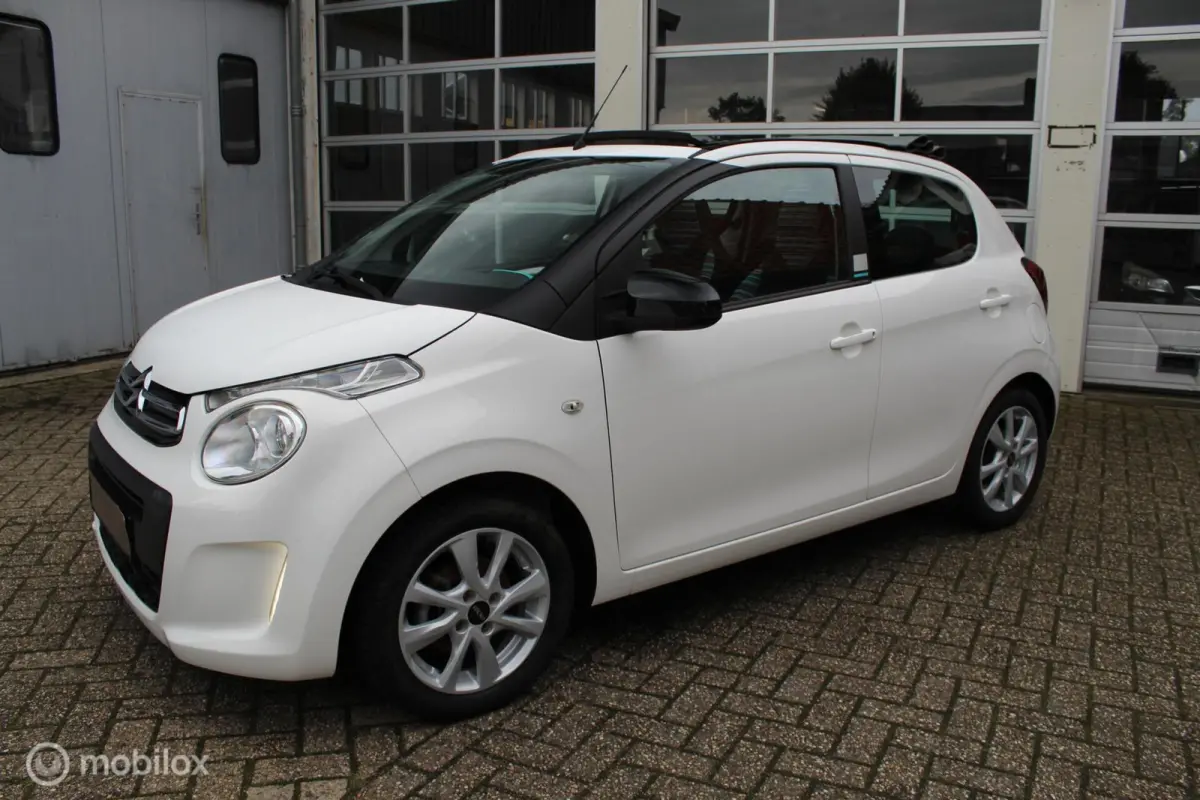 1.0-12V 69PK 5-DEURS NIEUW MODEL *Airscape-Shine* *CABRIOLET* *KLEUREN-/ENTERTAINMENTSCHERM ORIGINEEL* *BLUETOOTH HANDSFREE TEL.CARKIT&MEDIA INTERFACE/STREAMING* *OPEN-/ZONNEDAK* *AIRCONDITI