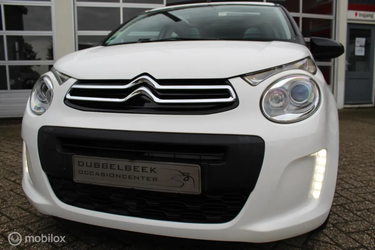 1.0-12V 69PK 5-DEURS NIEUW MODEL *Airscape-Shine* *CABRIOLET* *KLEUREN-/ENTERTAINMENTSCHERM ORIGINEEL* *BLUETOOTH HANDSFREE TEL.CARKIT&MEDIA INTERFACE/STREAMING* *OPEN-/ZONNEDAK* *AIRCONDITI