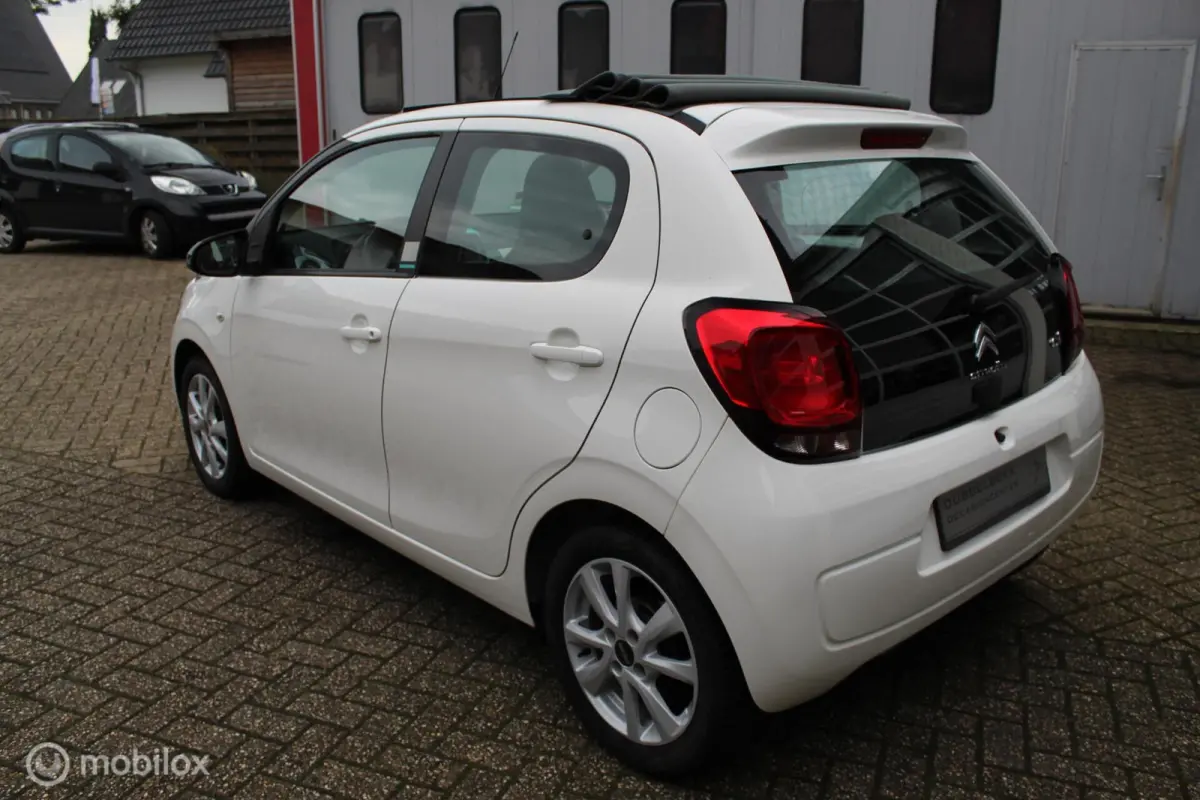 1.0-12V 69PK 5-DEURS NIEUW MODEL *Airscape-Shine* *CABRIOLET* *KLEUREN-/ENTERTAINMENTSCHERM ORIGINEEL* *BLUETOOTH HANDSFREE TEL.CARKIT&MEDIA INTERFACE/STREAMING* *OPEN-/ZONNEDAK* *AIRCONDITI