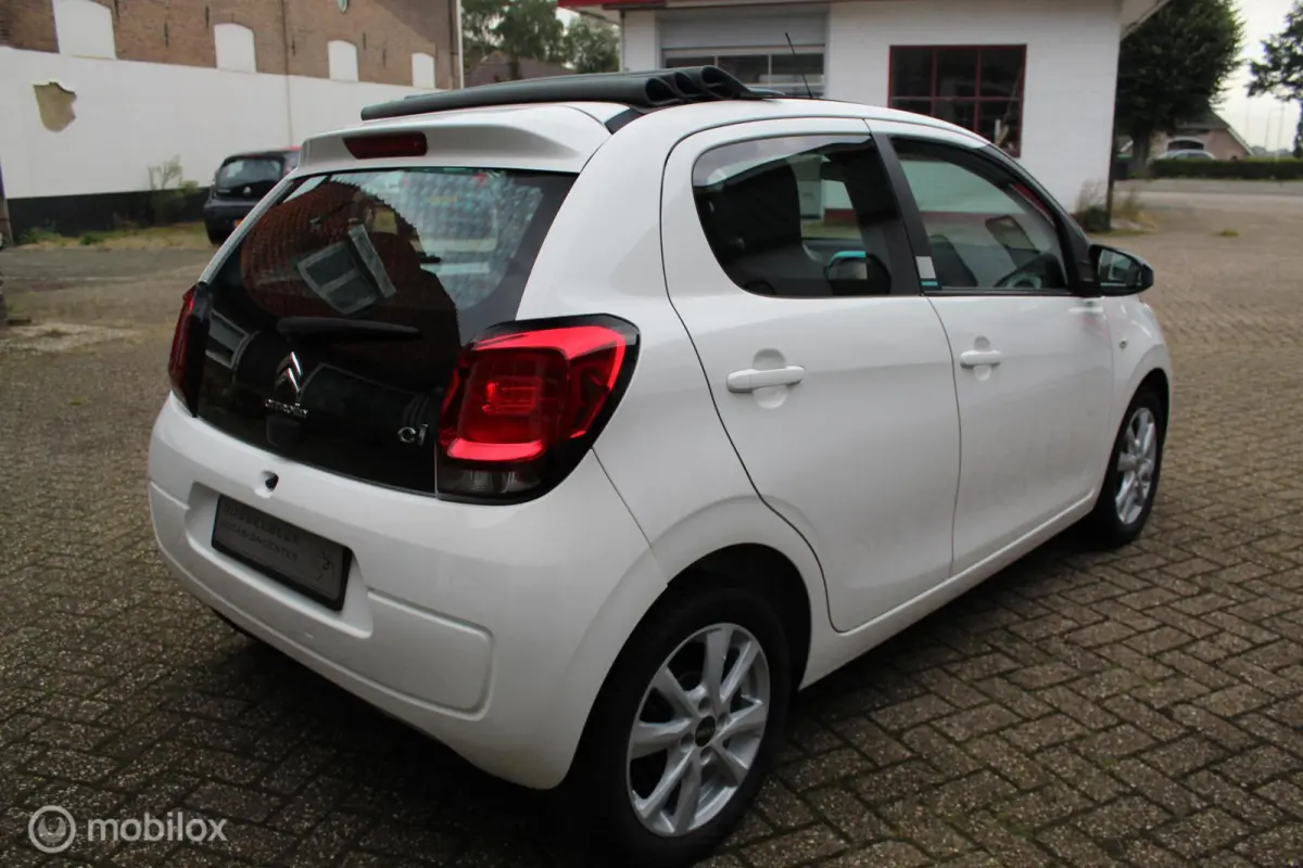 1.0-12V 69PK 5-DEURS NIEUW MODEL *Airscape-Shine* *CABRIOLET* *KLEUREN-/ENTERTAINMENTSCHERM ORIGINEEL* *BLUETOOTH HANDSFREE TEL.CARKIT&MEDIA INTERFACE/STREAMING* *OPEN-/ZONNEDAK* *AIRCONDITI
