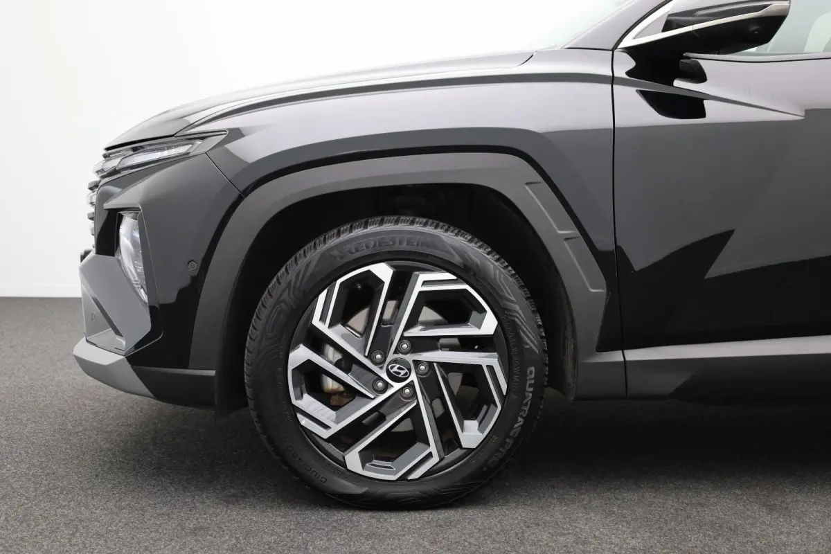 1.6 T-GDI PHEV Premium | Achterbank in delen neerklapbaar | Achterruitverwarming | Achteruitrij assistent | Leder | Stoelverwarming & Stoelventilatie | Elektrische achterklep | Elektr. stoel