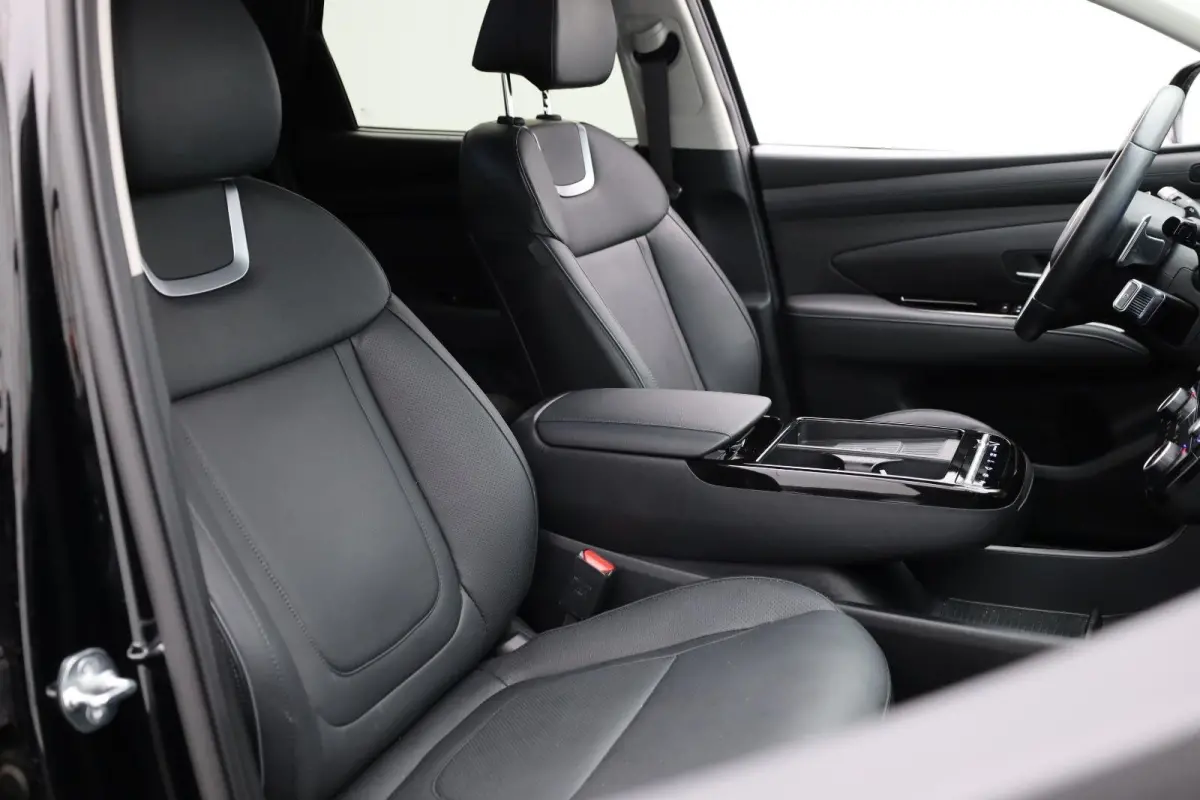 1.6 T-GDI PHEV Premium | Achterbank in delen neerklapbaar | Achterruitverwarming | Achteruitrij assistent | Leder | Stoelverwarming & Stoelventilatie | Elektrische achterklep | Elektr. stoel