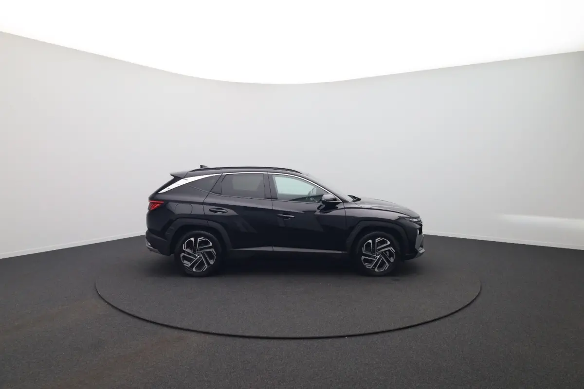 1.6 T-GDI PHEV Premium | Achterbank in delen neerklapbaar | Achterruitverwarming | Achteruitrij assistent | Leder | Stoelverwarming & Stoelventilatie | Elektrische achterklep | Elektr. stoel