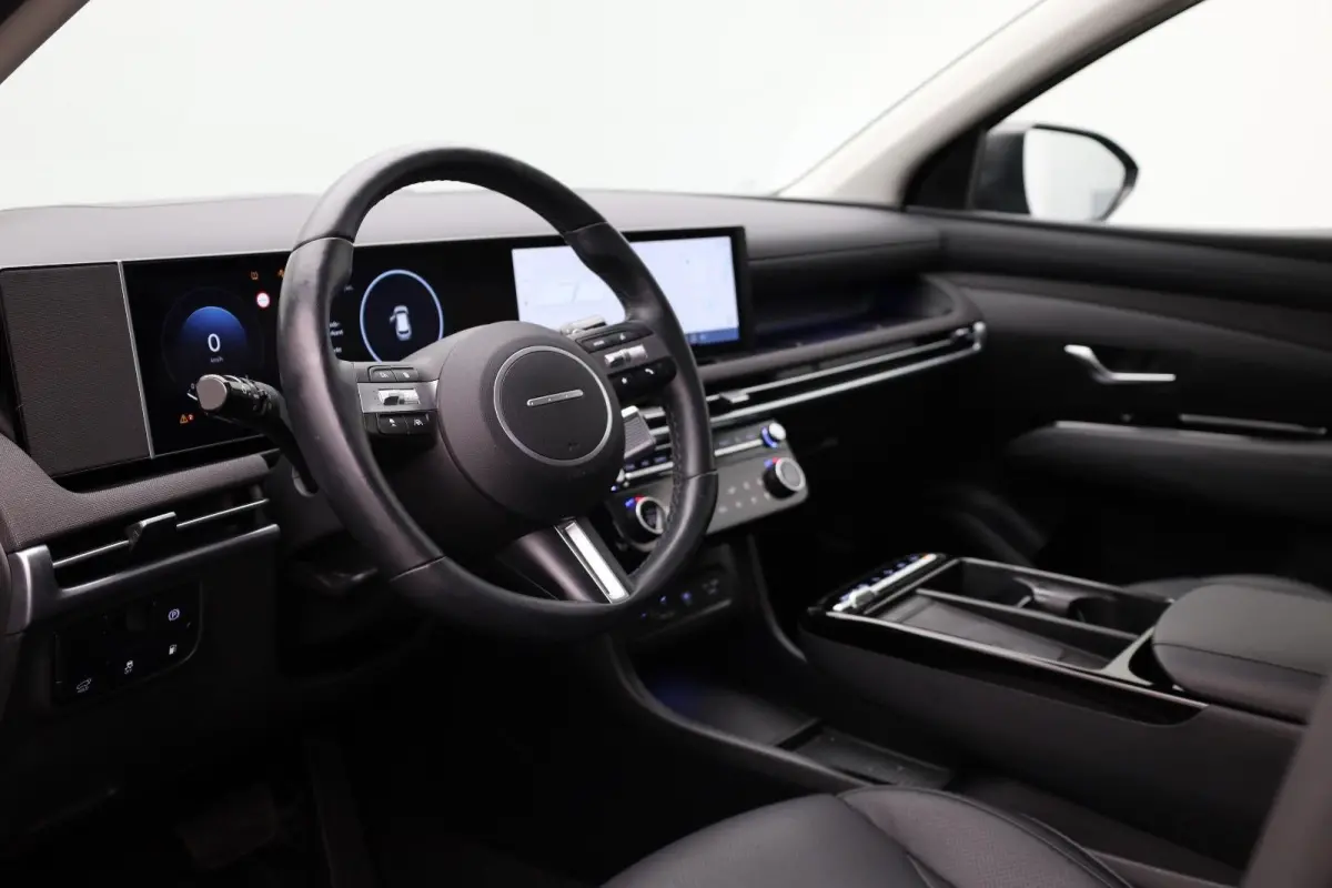 1.6 T-GDI PHEV Premium | Achterbank in delen neerklapbaar | Achterruitverwarming | Achteruitrij assistent | Leder | Stoelverwarming & Stoelventilatie | Elektrische achterklep | Elektr. stoel