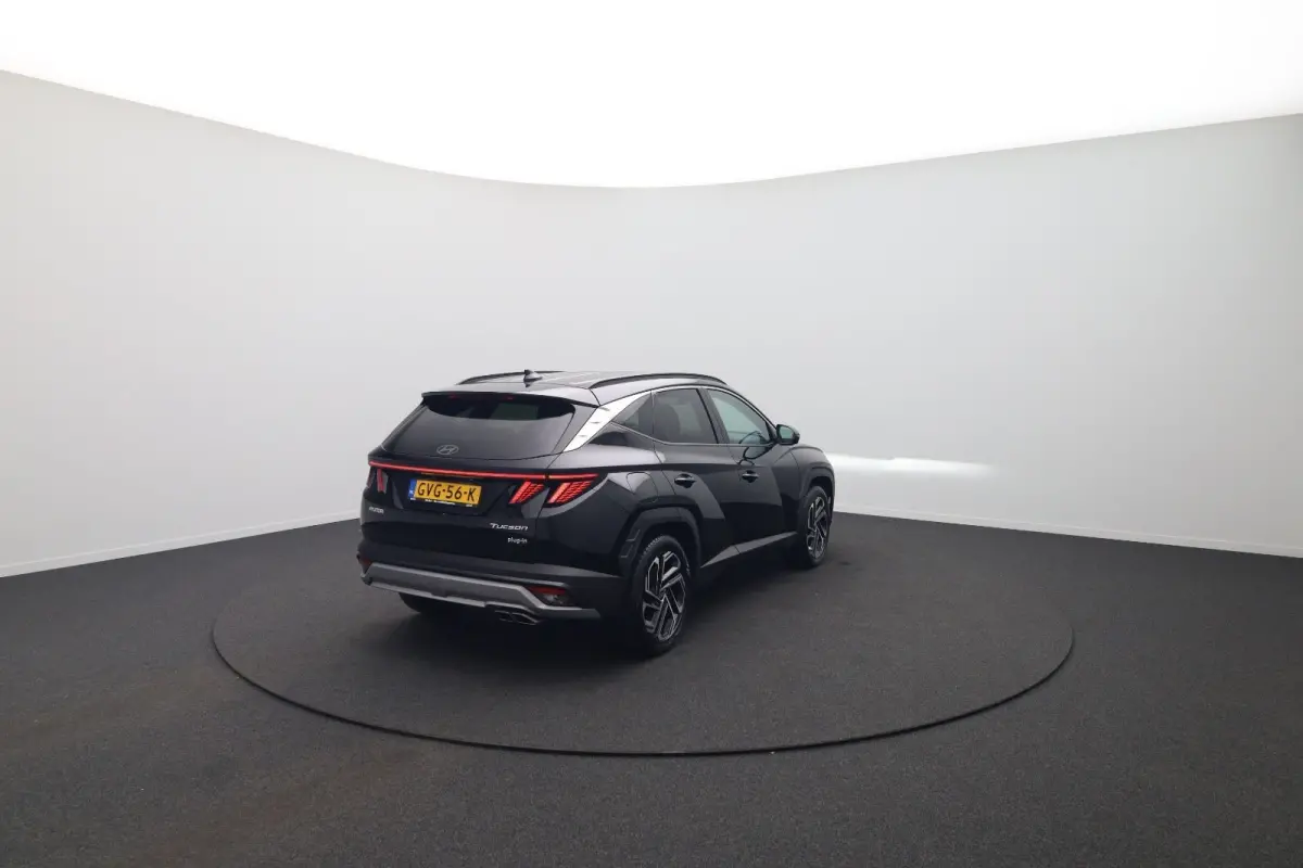 1.6 T-GDI PHEV Premium | Achterbank in delen neerklapbaar | Achterruitverwarming | Achteruitrij assistent | Leder | Stoelverwarming & Stoelventilatie | Elektrische achterklep | Elektr. stoel