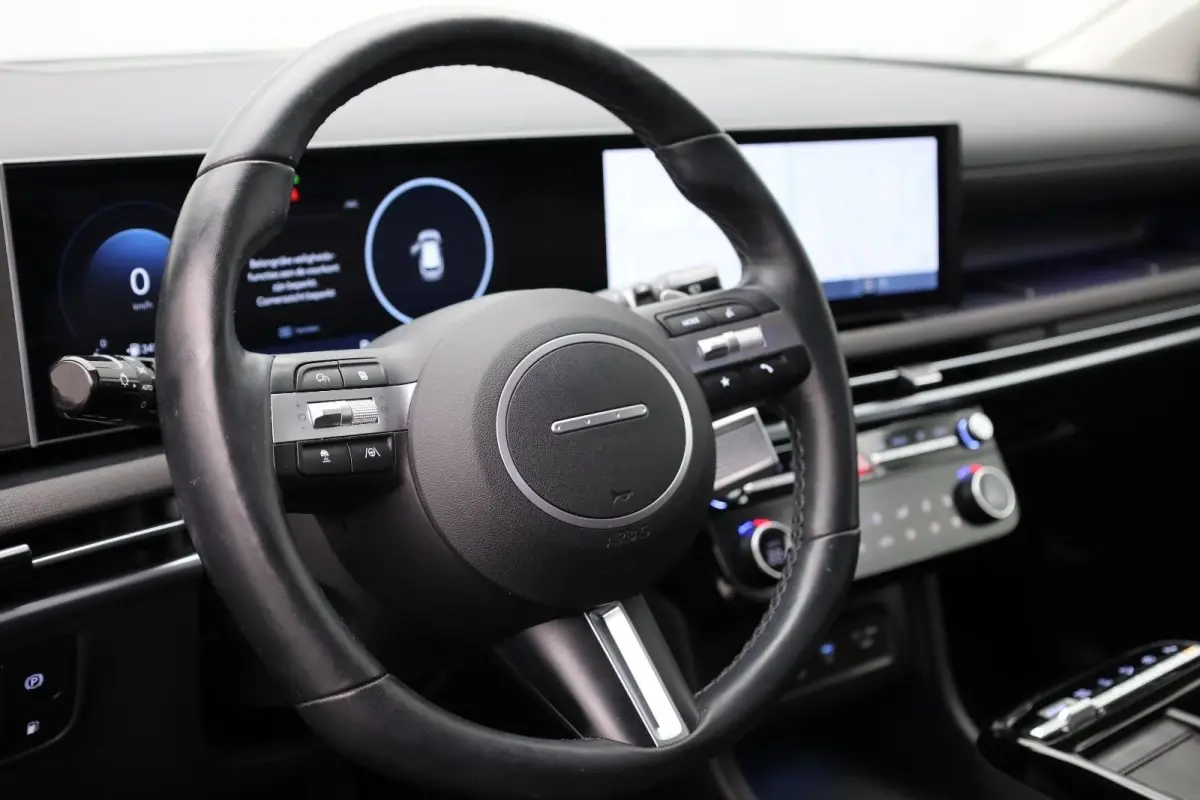 1.6 T-GDI PHEV Premium | Achterbank in delen neerklapbaar | Achterruitverwarming | Achteruitrij assistent | Leder | Stoelverwarming & Stoelventilatie | Elektrische achterklep | Elektr. stoel