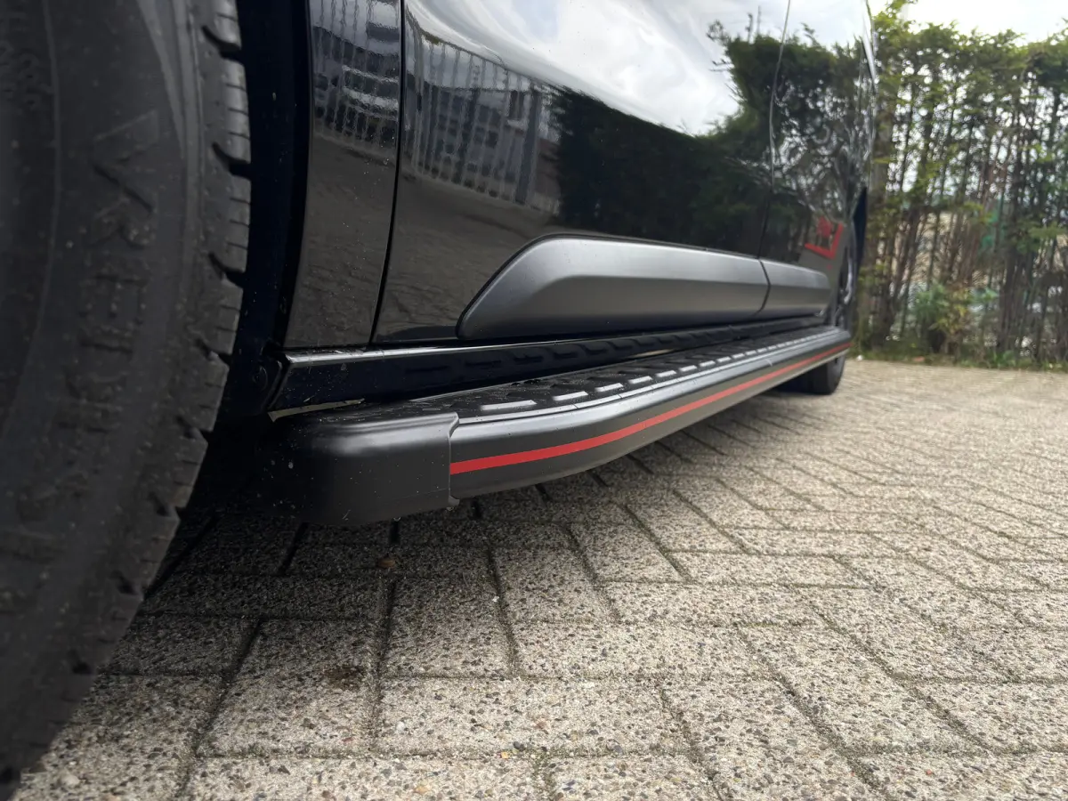 EV L2 75 kWh Dynamic By Revolve | Betimmering | Camera | Stoelverwarming | Cruise Control | Navi | CLimate | Leder | Sidesteps | LED | Keyless
