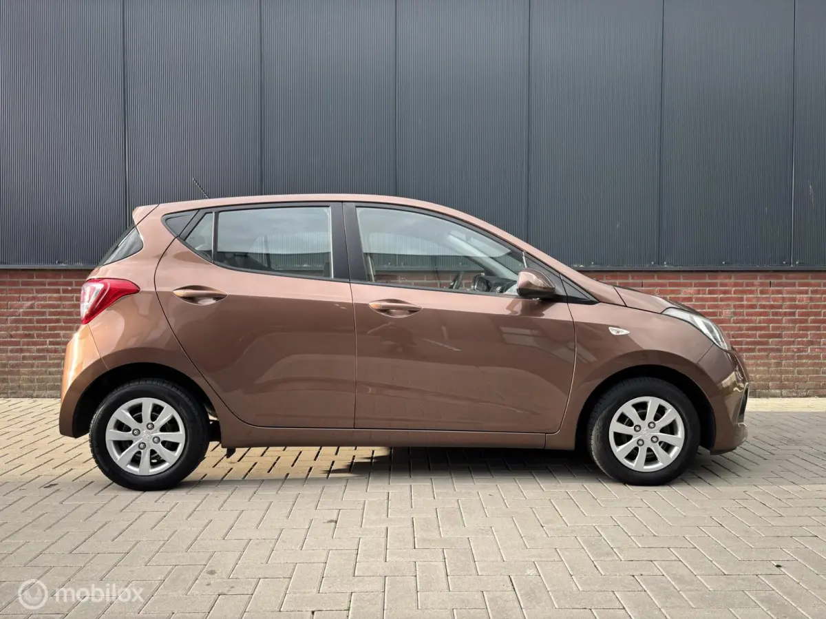 1.0i i-Motion Comfort | Cruise | Climate control