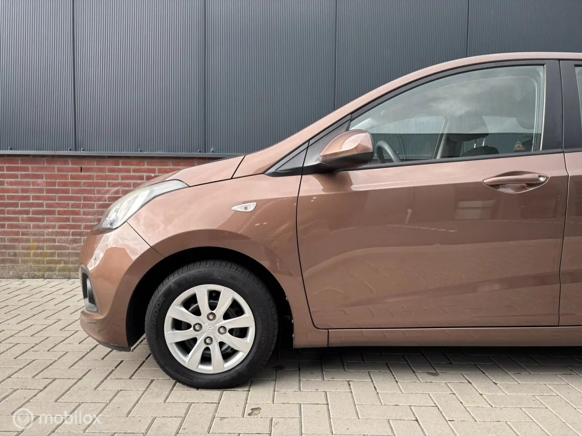 1.0i i-Motion Comfort | Cruise | Climate control