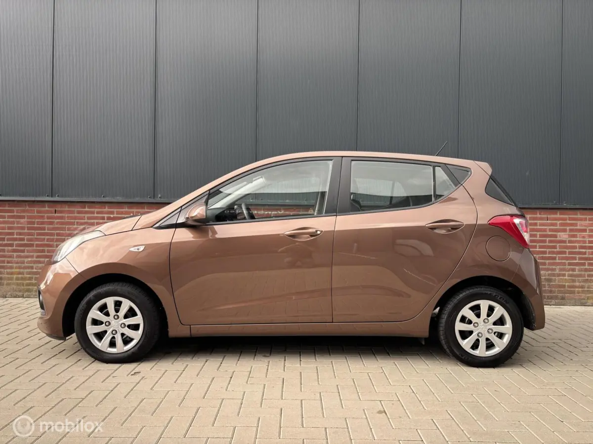 1.0i i-Motion Comfort | Cruise | Climate control