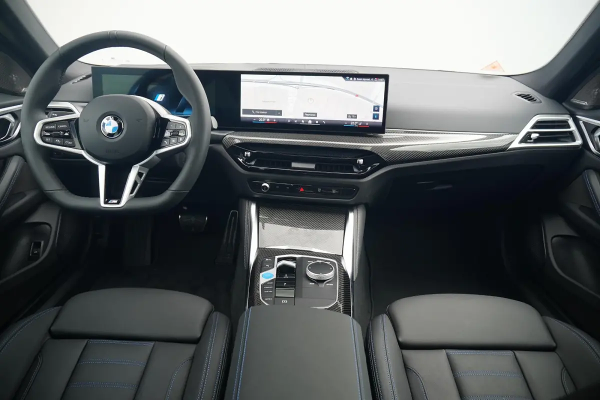 eDrive40 | M Sportpakket Pro | Harman Kardon | Active Cruise Control | Elektrisch verstelbare stoelen | Trekhaak