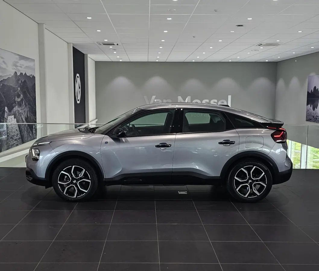 Feel 50 kWh Climate Control | Full Map Navigatie | Apple Carplay / Android Auto | Camera | Parkeersensoren | Bekleding Half Leder | 18" Lichtmetalen Velgen
