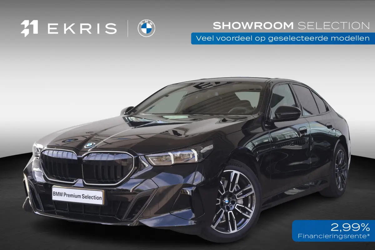 eDrive40 | SOH 100% | Cruise Control Adaptief met Stop&Go | Glazen Panoramadak | Head-Up Display | Iconic Glow Grill | Harman/Kardon