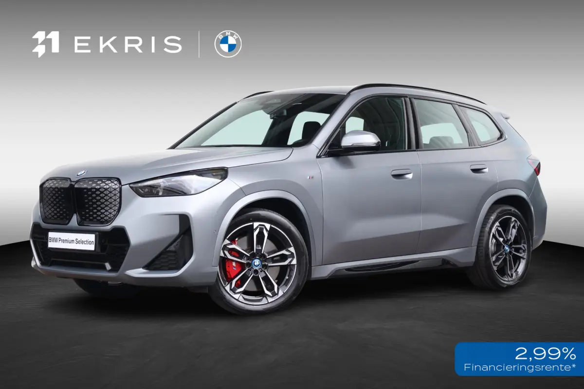 eDrive20 67 kWh M Sport Edition | SoH 100% | Sportpakket Pro | 19'' LM | Stoelverwarming Voor | Achteruitrijcamera |