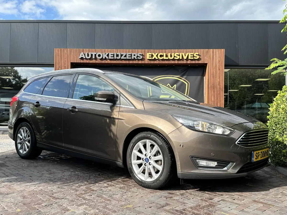 1.0 Titanium Keyless Cruise Control Stoelverw. Navi PDC 16''LM