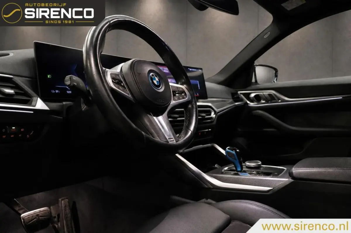 eDrive40 M-sport 84 kWh | virtual widescreen cockpit | adaptieve cruise control | led | camera | high executive |