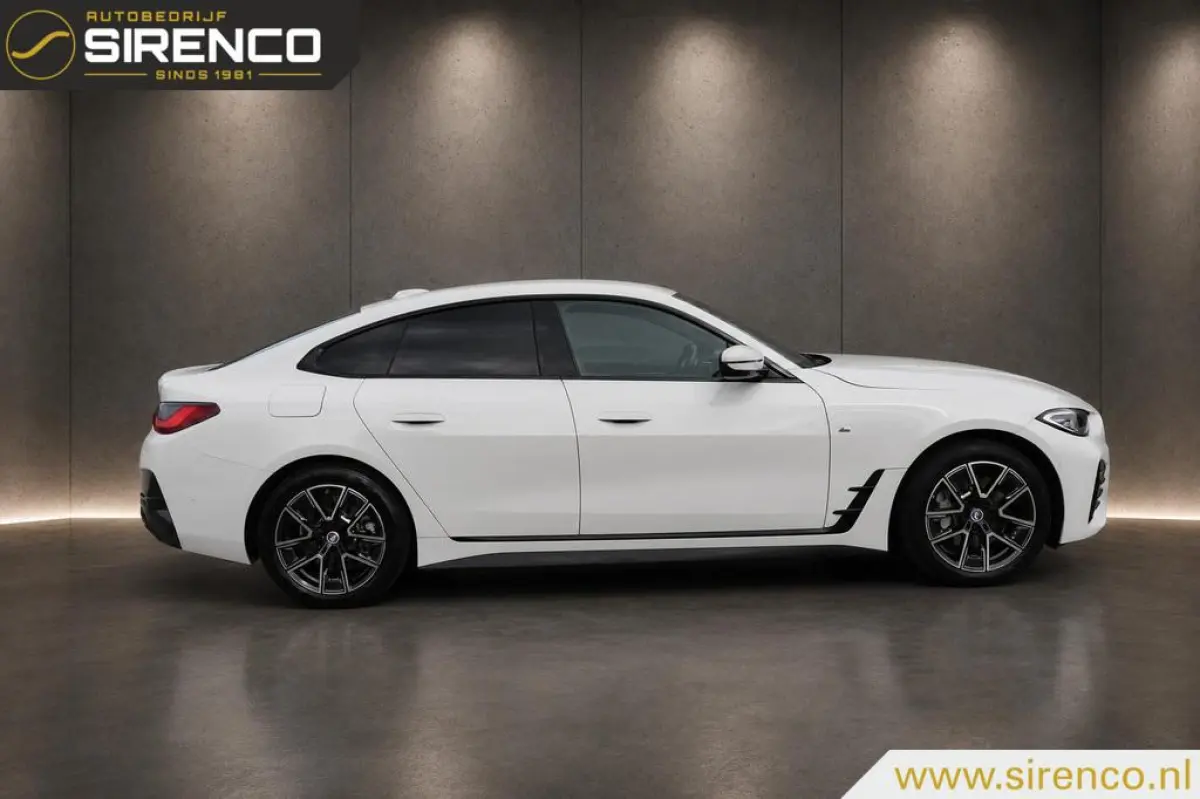 eDrive40 M-sport 84 kWh | virtual widescreen cockpit | adaptieve cruise control | led | camera | high executive |