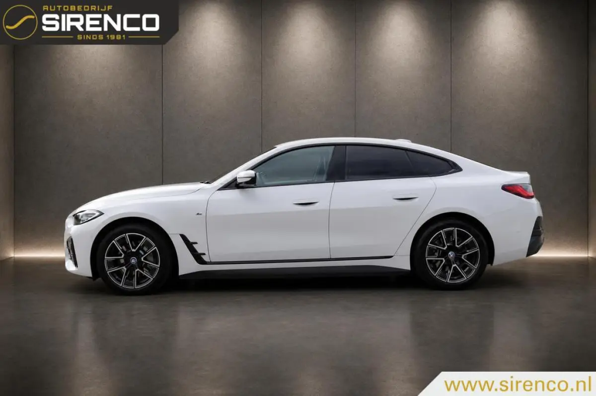 eDrive40 M-sport 84 kWh | virtual widescreen cockpit | adaptieve cruise control | led | camera | high executive |