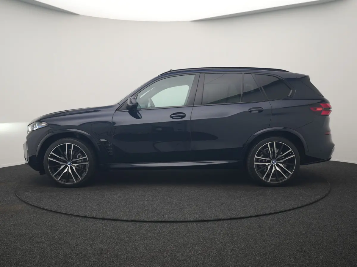 xDrive50e High Executive PHEV 490pk Dealer O.H. | Panodak Sky Lounge | M Sport | Luchtvering | Head Up | 360 Camera | Harman / Kardon | Nappa Lederen Comfortstoelen Memory & Verwarmd | Carbo